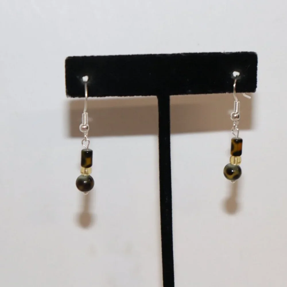 Beautiful NWOT Silver, animal print and yellow dangle earrings 1.5
